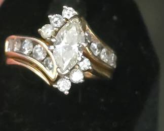 1.46 ct Marquise cut diamond Bridal Set with paperwork wedding band is removable shown in last pic and none of these pictures show how nice any of the diamonds are they just can't grab the sparkle 