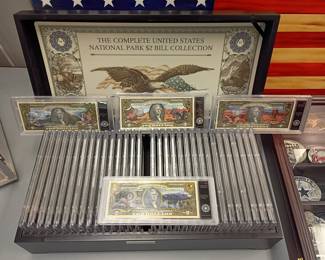 complete United states National Park 2dollar bill collection in collectors' case and another case partially full 