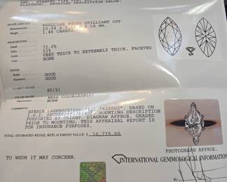 1.46 ct Marquise cut diamond Bridal Set with paperwork wedding band is removable shown in last pic and none of these pictures show how nice any of the diamonds are they just can't grab the sparkle 