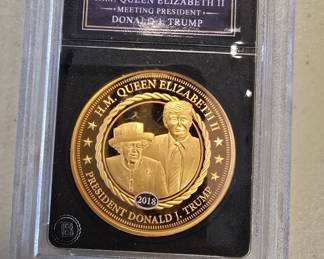Queen Elizabeth and Donald Trump. Coin.