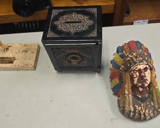 antique cast iron bank and chalkware indian head match holder 