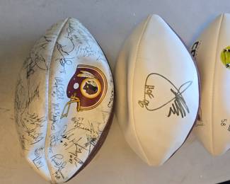 footballs one with autograph 