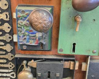 absolutely amazing vintage lock and key collection., from Girard Butler. these were made circa 1920 and the actual boards are in the photo album along with other collections Girard Butler collected. we will be selling them by the board, many of the locks have tags and dates from where they came even a lock from the 12th President Zachary Taylors home.  boards are roughly 6ft long !