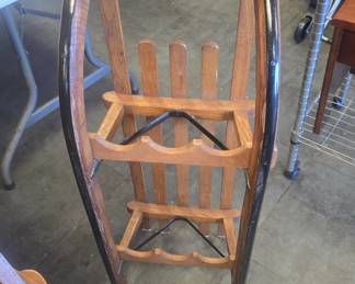 Vintage sled converted to a wine holder.