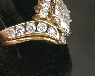 1.46 ct Marquise cut diamond Bridal Set with paperwork wedding band is removable shown in last pic and none of these pictures show how nice any of the diamonds are they just can't grab the sparkle 