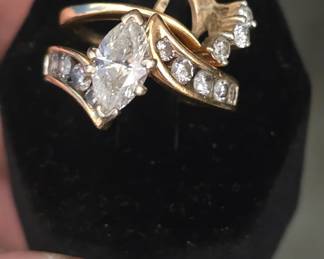 1.46 ct Marquise cut diamond Bridal Set with paperwork wedding band is removable shown in last pic and none of these pictures show how nice any of the diamonds are they just can't grab the sparkle 