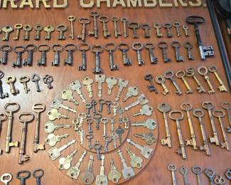 absolutely amazing vintage lock and key collection., from Girard Butler. these were made circa 1920 and the actual boards are in the photo album along with other collections Girard Butler collected. we will be selling them by the board, many of the locks have tags and dates from where they came even a lock from the 12th President Zachary Taylors home.  boards are roughly 6ft long !