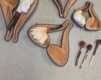 Vintage Meerschaum pipe collection.