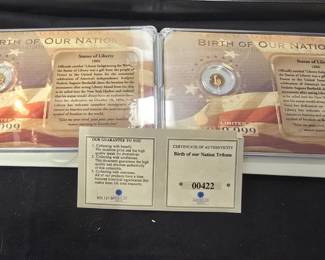 two half gram 14k memorial coins 