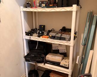 Cameras, radios, Sony Discman, tape recorders etc