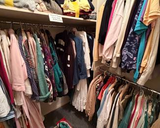 One of many closets full of clothes 