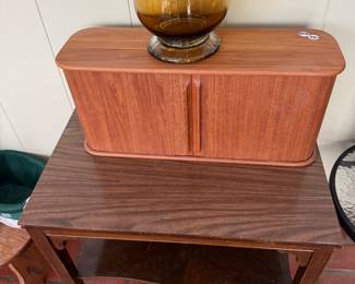 MCM table and Danish Teak tabletop
Cabinet with rolling doors 
