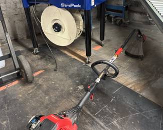 Weed eater and strapping machine