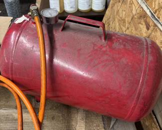 Air tank with pressure gauge and hose