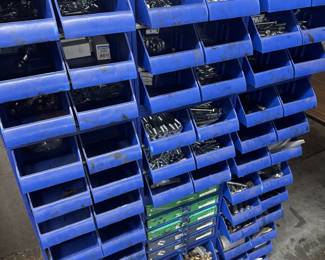 Nuts and bolts bin, filled with nuts and bolts and other hardware. Sold all together.