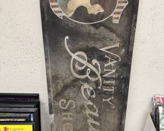 Vintage sign for a beauty shop that used to be located in The Commercial Dispatch building.