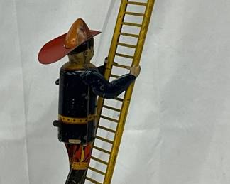 Mechanical Ladder Climbing Fireman Tin Litho Toy, 5x22in