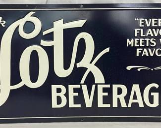 Emb. Lotz Beverages Metal Sign, 24in x 12in