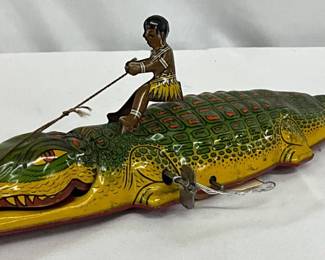 Early Rider on Alligator Tin Wind Up Toy, Measures 14in by 3in