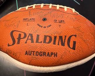 Autographed Carolina football with Lawrence Taylor autograph and others