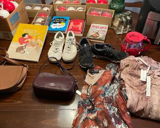 Some of the many clothing items at the sale. More than quadruple this amount will be at the sale.