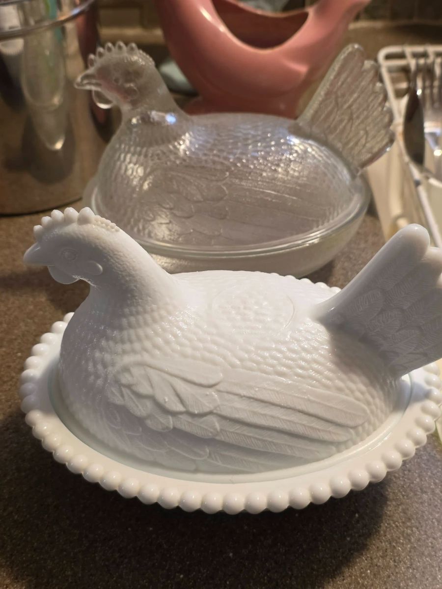 Milk glass and clear glass hens on nest