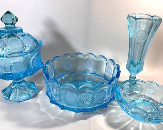 Assorted blue coin glass