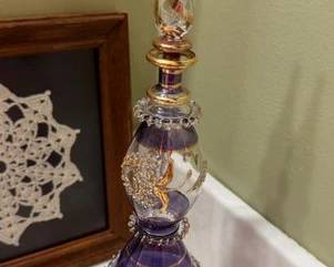 Egyptian glass perfume bottle