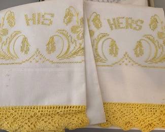 Multiple sets of vintage embroidered pillow cases