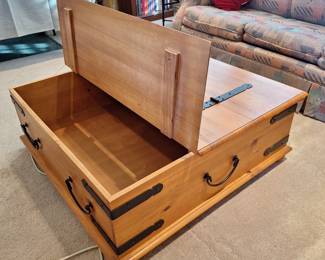 Open storage coffee table with wheels