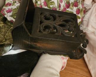 vintage cast iron wall-mounted match box holder. 