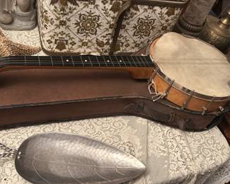 vintage banjo ukulele or banjolele, a hybrid instrument combining a small banjo body with a ukulele neck