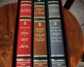 This is a Chatham River Press Classics of Mystery boxed set of hardcover books featuring novels by Dashiell Hammett, John Le Carré, and Raymond Chandler. 