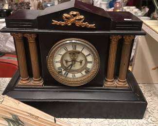Antique Ansonia black-painted metal mantel clock