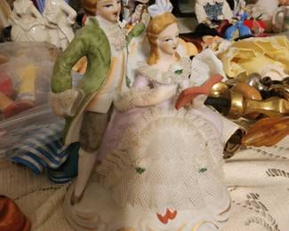 vintage German Dresden porcelain lace figurine depicting a courting couple.