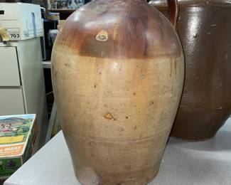 Collection of 14 jugs or crocs. I will be adding on more pictures later tomorrow before the auction starts.