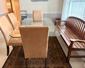 $400 Glass top table with 4 chairs (dark wood base)