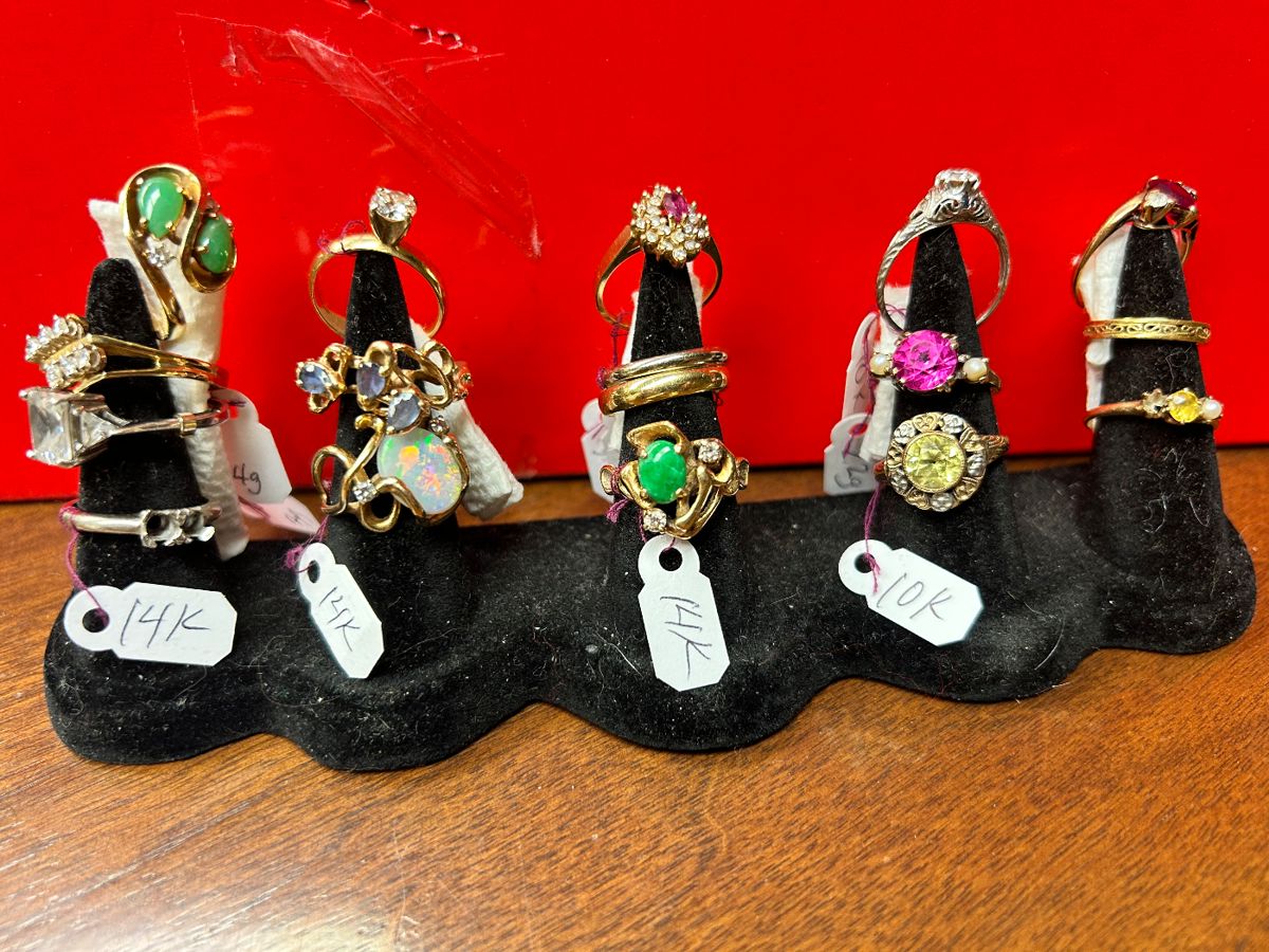 An assortment of Ladies 10K  and 14K gold rings.
