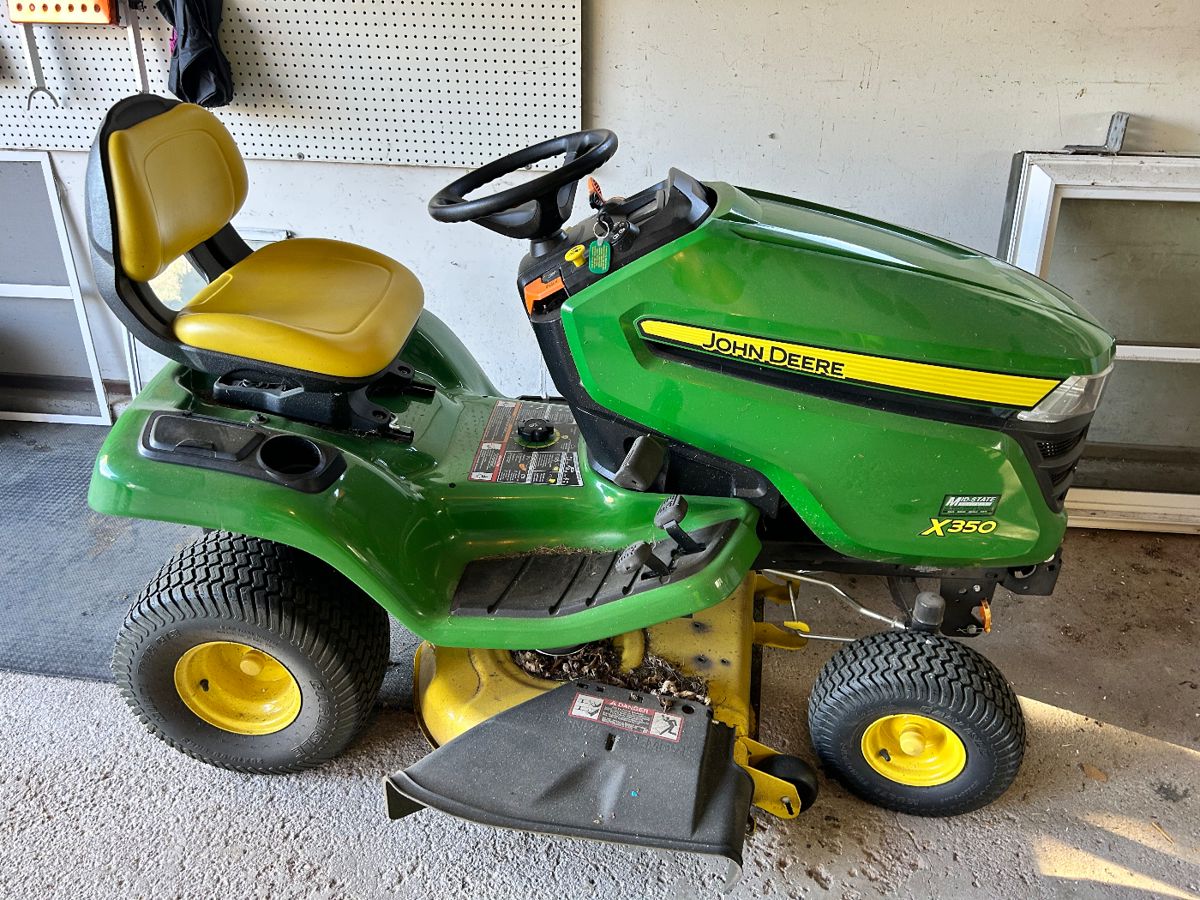 John Deere X350 riding lawn mower. In GREAT shape and just in time for the spring cutting.