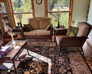 A GREAT wicker set and shows off one of the three Thomasville 7'9" x 10' area rugs.