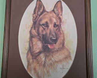A framed print of a German Sheppard dog by artist Leo Janson (1930-1980.)