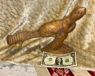 A wonderful, detailed, hand-carved squirrel.