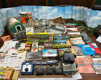 More German Companies - Marklin and Faller model railway trains, layouts, and accessories. Including super transistors, controllers, switch points, turntable, 3 stall roundhouse, various building kits, couple dozen catalogues/manuals, foam tunnel and a whole lot more accessories.