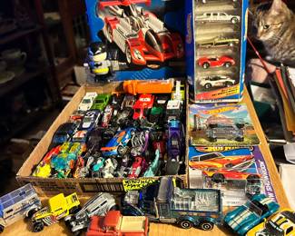Dozens of Hot Wheels and Matchbox cars.