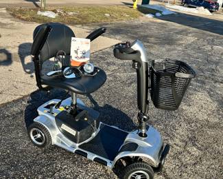 Vocic Mobility Scooter. Comes with the accessories and the manual. BRAND NEW!!!! Literally has less than an hour of use...
