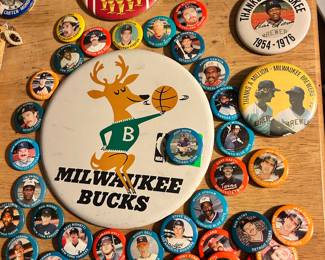 An assortment of sport buttons.