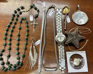 More beautiful sterling silver pieces, and in the lower right hand corner is a Benrus watch with a 14 karat gold housing.