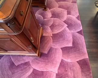 Purple Floral Design Wool Area Rug. Measures 5' x 7'. Photo 1 of 2.