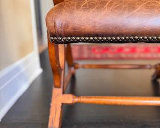 Walter E. Smithe English Georgian Style "Campaign" Chair Upholstered in Tobacco Leather and Matching Ottoman with Nailhead Trim. Measures 26" W x 30" D. Photo 4 of 7.