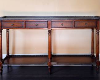 Theodore Alexander Louis XVI Leather Top Console and Brass Gallery. Measures 58" W x 11" D x 33" H to Gallery. Photo 1 of 7.